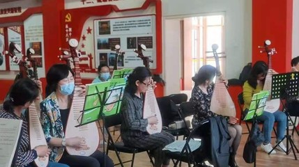 一揉玉弦萬般情，彈支紅曲給黨聽 文化藝術(shù)交流的深情頌歌